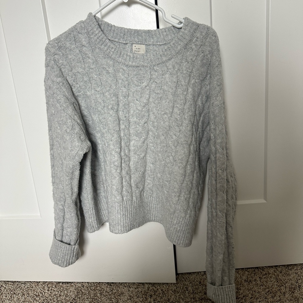 Cable knit target sweater